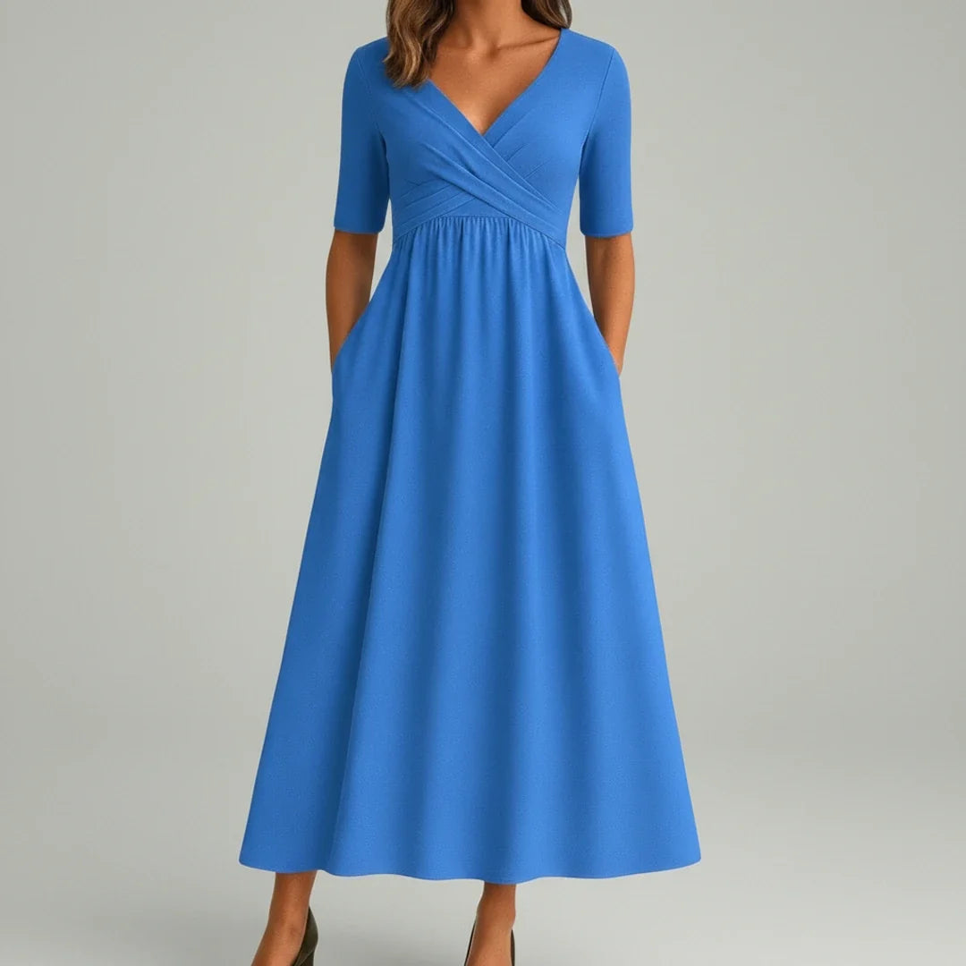 Stylish sleeveless A-line midi dress for women, with a chic V-neck and functional pockets for everyday wear.