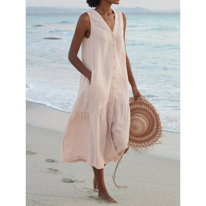 Casual women's tiered hem sleeveless midi dress, featuring a stylish V-neck and functional button front.