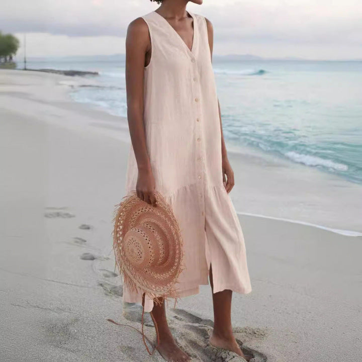 Sleeveless tiered midi dress for women, a comfortable V-neck button-front design for beach days.