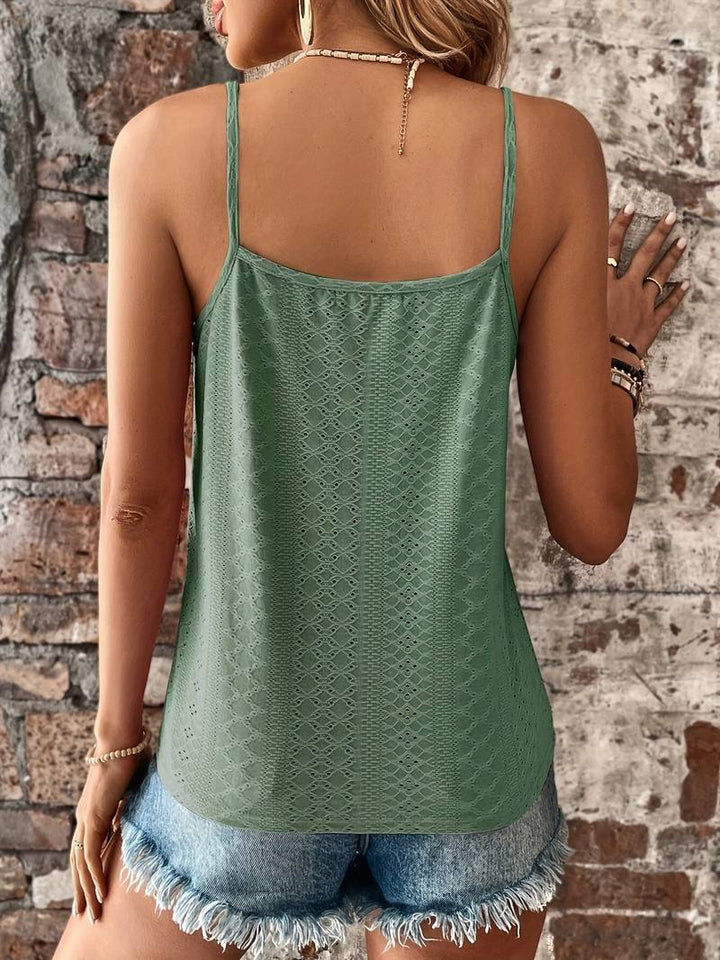 Casual women's V-neck cami with adjustable straps & intricate lace detail. Summer fashion.