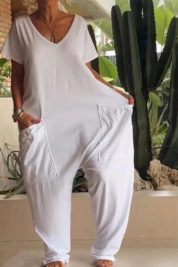 Soft, comfortable women's V-neck jumpsuit. Relaxed fit, short sleeves, & dropped crotch for effortless casual wear.