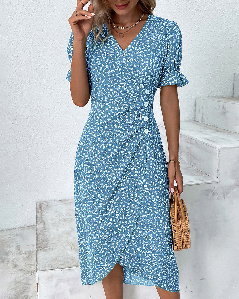 A-line v-neck floral midi dress with a comfortable flowy fit, ideal for warm weather vacation wear.