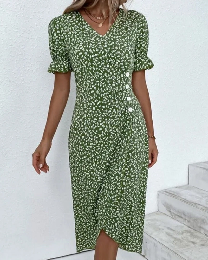 Lightweight flowy summer dress with a vibrant floral print and flattering v-neck, great for vacations.