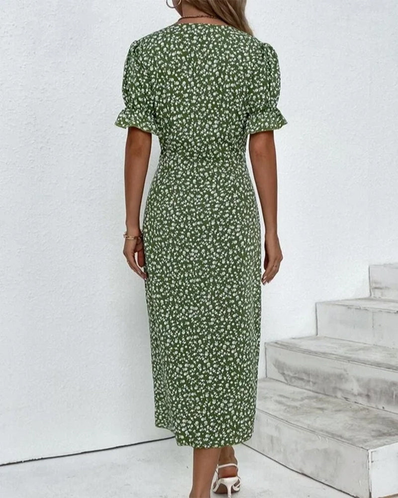 Women's A-line midi dress featuring a deep V-neck and beautiful floral pattern, perfect for sunny days.