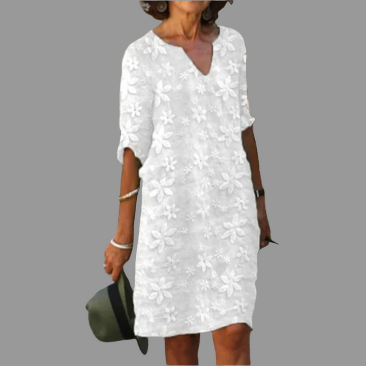 Women's V-neck floral print midi dress. Comfortable and elegant summer fashion for daily wear or special occasions.