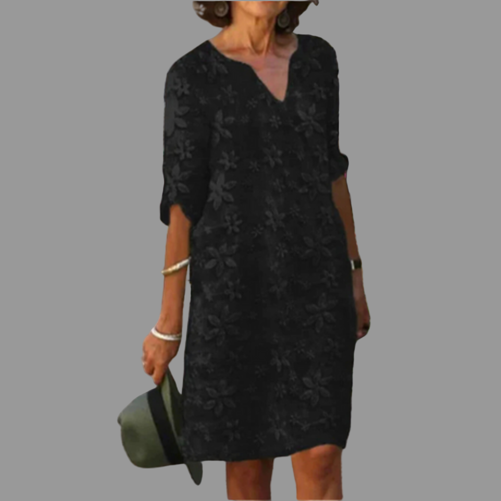 Chic women's V-neck floral midi dress. Versatile spring outfit, perfect for casual events or elegant gatherings.