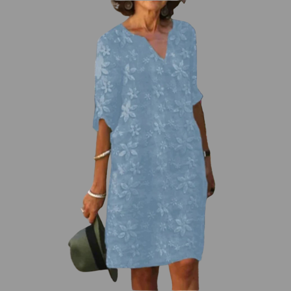 Elegant women's V-neck midi dress with vibrant floral print. Ideal for spring, summer, and special occasions.