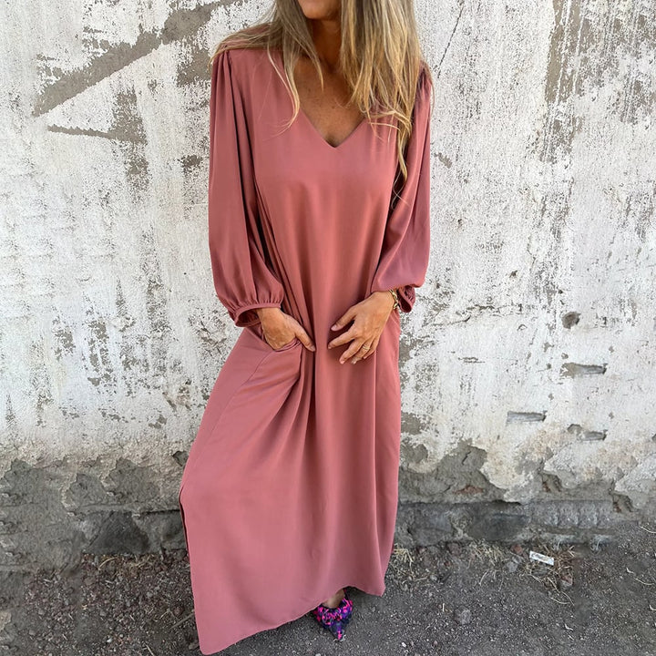 Flowy V-neck maxi dress for women, with chic balloon sleeves & hidden pockets. Versatile for casual, summer, or resort wear.