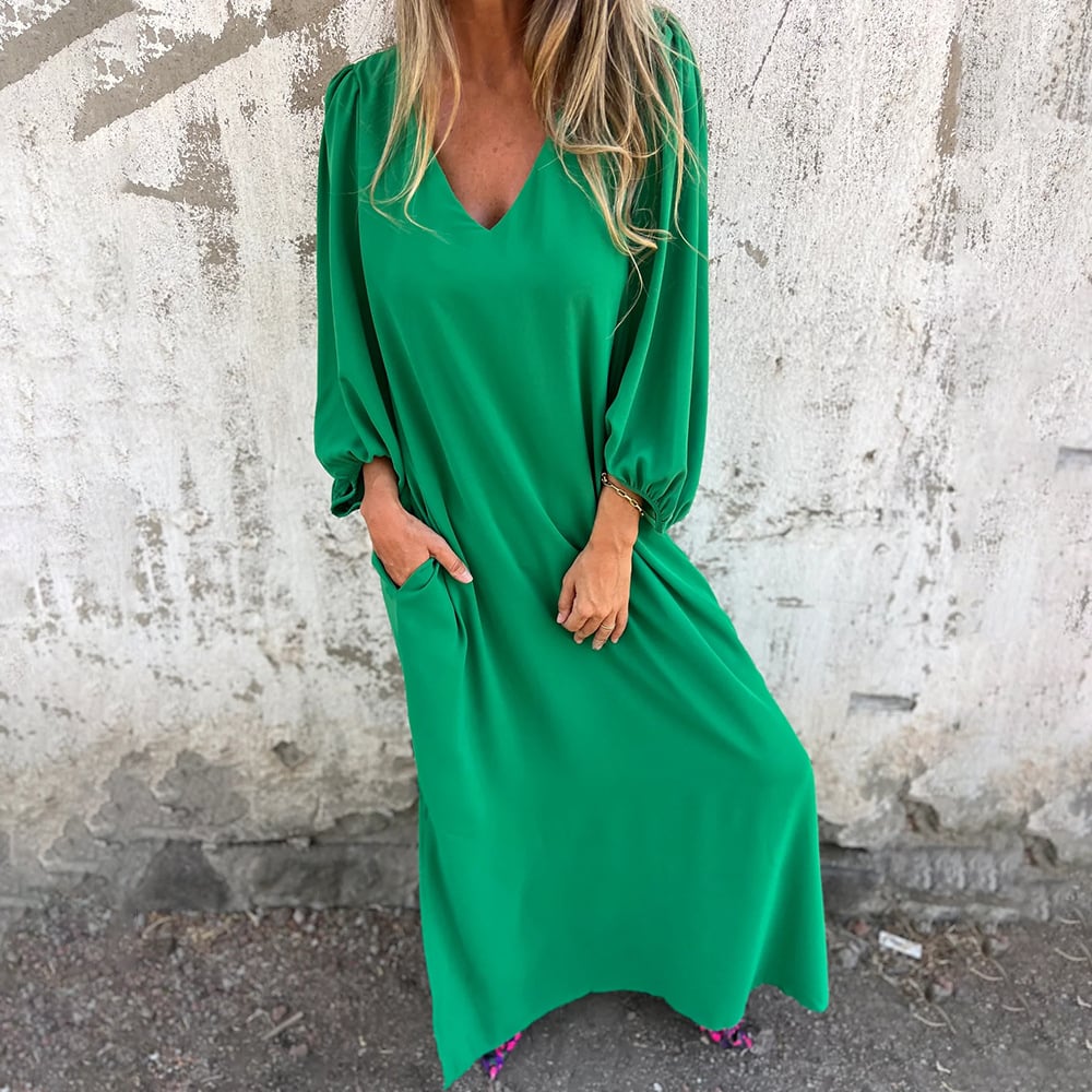 Relaxed women's V-neck maxi dress with loose balloon sleeves & convenient pockets. A comfortable and elegant long summer dress.