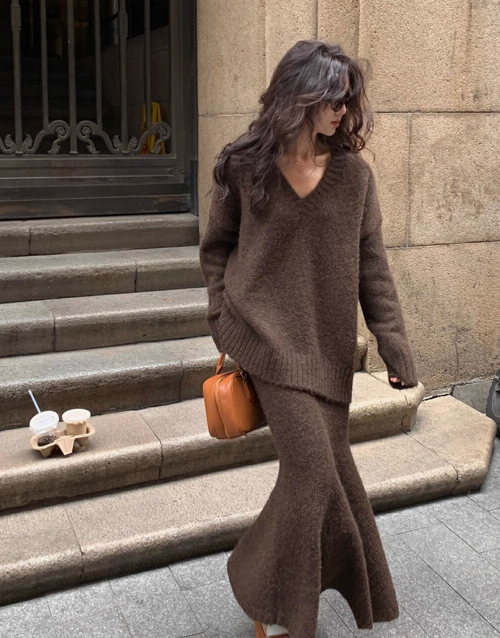 Women's V-neck long sleeve sweater & midi skirt two-piece set, ideal for elegant brunch outfits.