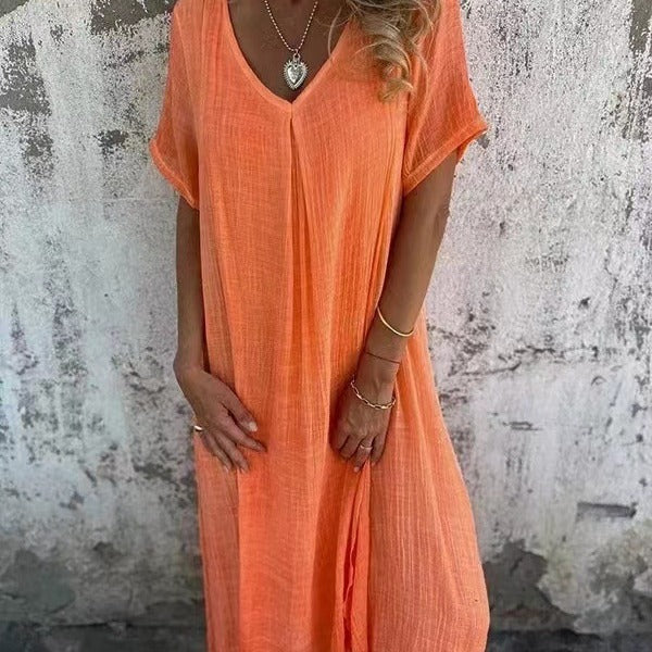 Chic women's V-neck loose fit midi dress, combining comfortable design with versatile summer style.