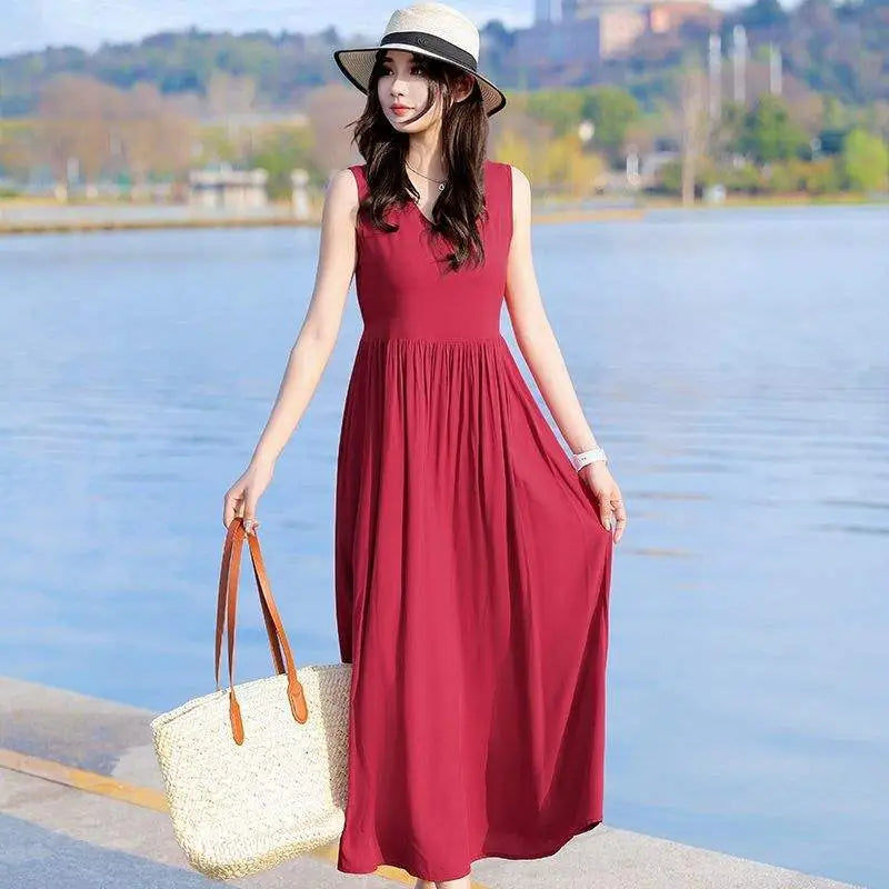 Women's V-neck maxi dress with tie waist and pockets, perfect for casual summer fashion.