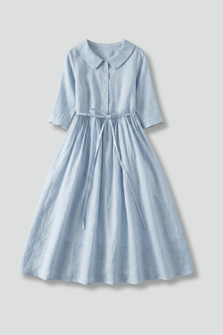 Women's V-neck midi dress with a flattering waist tie, perfect for elegant spring & summer fashion.