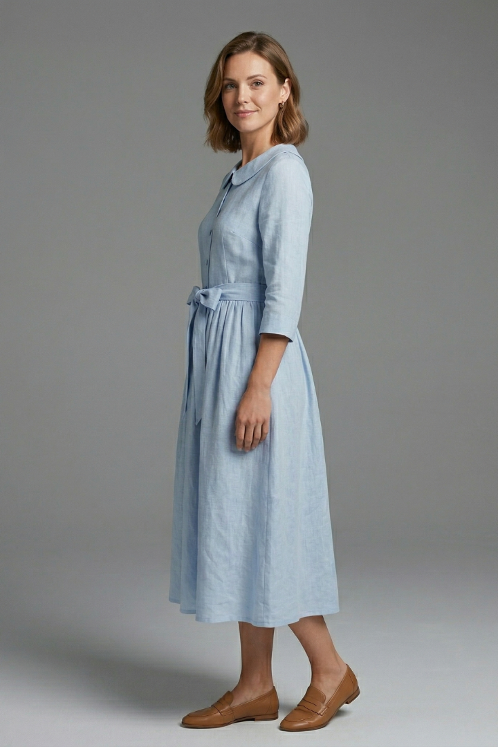 Flattering women's midi dress with an elegant waist tie, enhancing the silhouette for versatile wear.