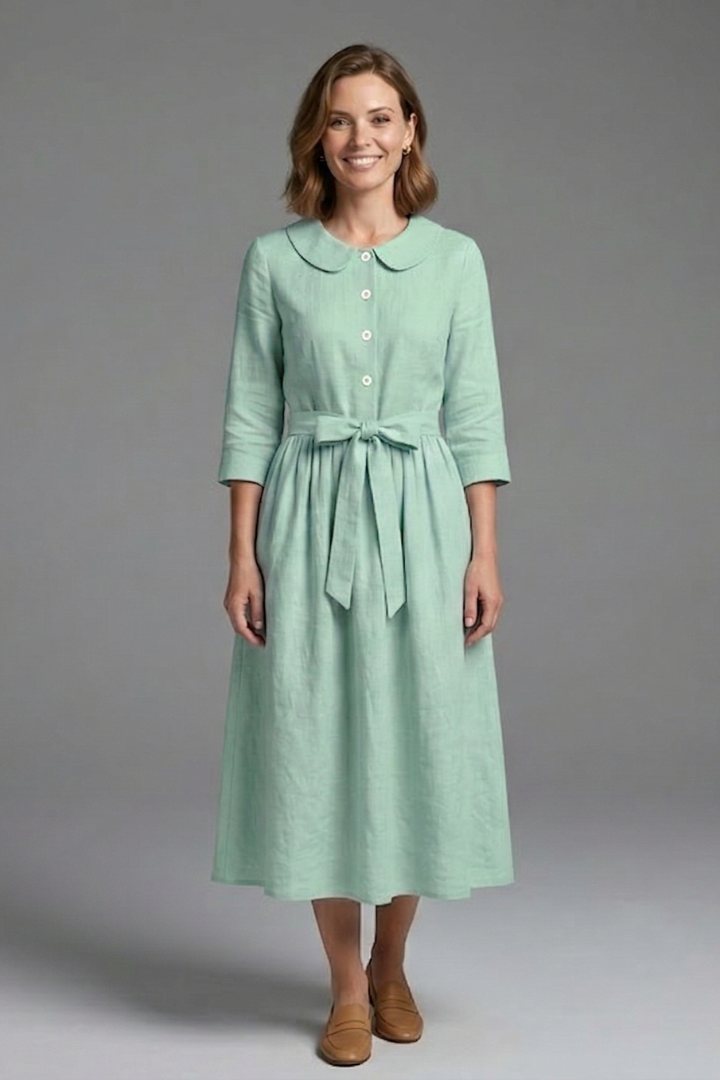 Comfortable women's V-neck midi dress with a waist tie, a versatile and flattering piece of clothing.