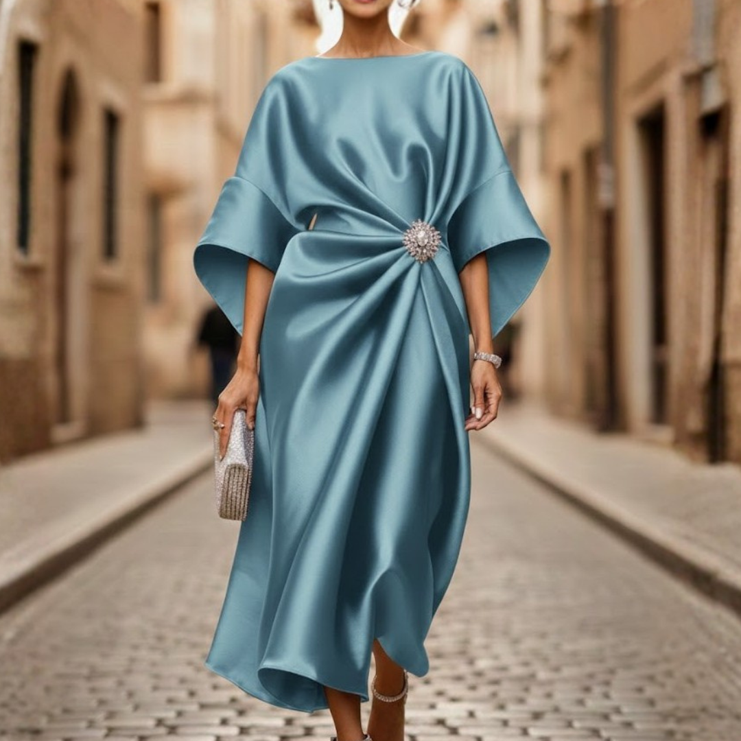 Elegant women's midi dress featuring a V-neckline, elbow sleeves, and a flattering flared A-line skirt.