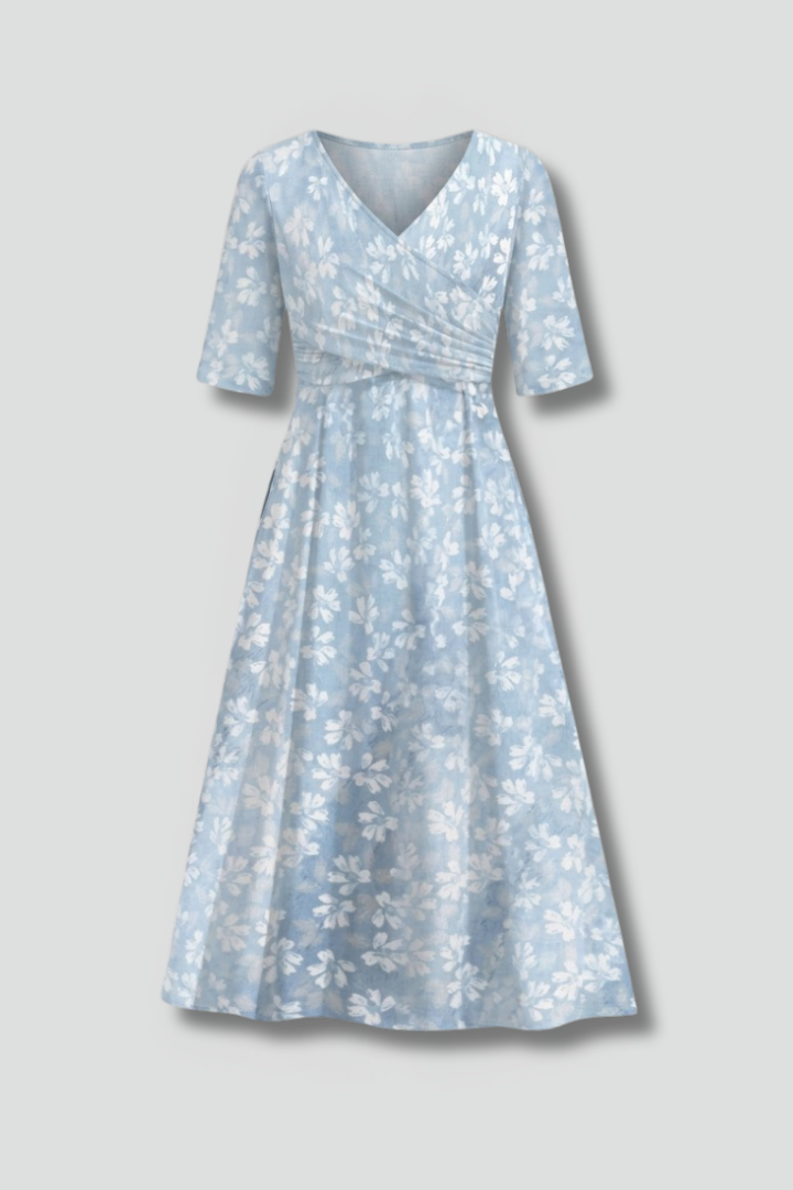 Women's V-neck midi dress with pockets. Relaxed fit, short sleeve, perfect for casual spring/summer wear.