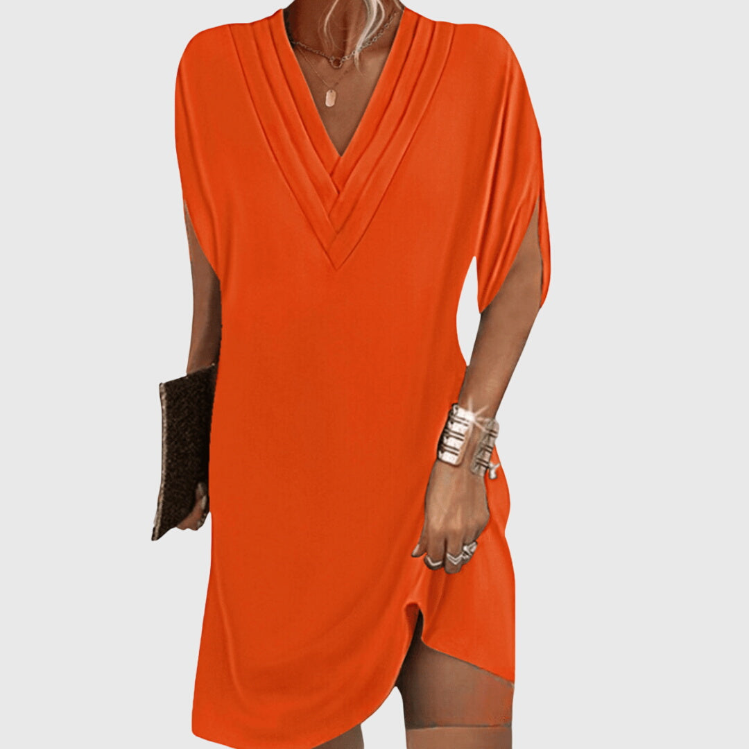 Casual women's V-neck mini dress, draped short sleeve cocoon style, perfect for resort & everyday wear.