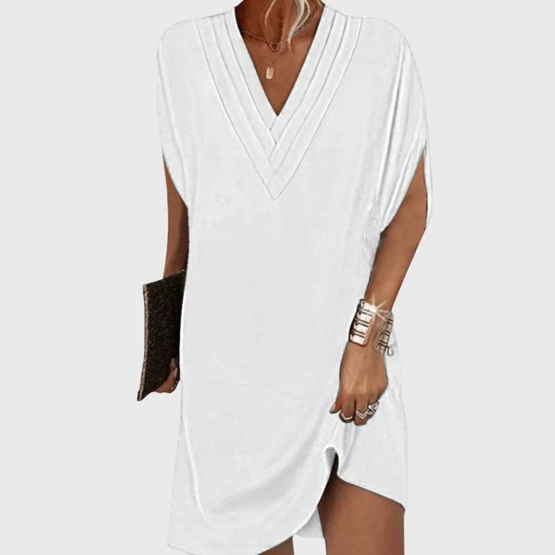 Chic V-neck mini dress for women, draped short sleeves & relaxed fit. A versatile summer fashion piece.