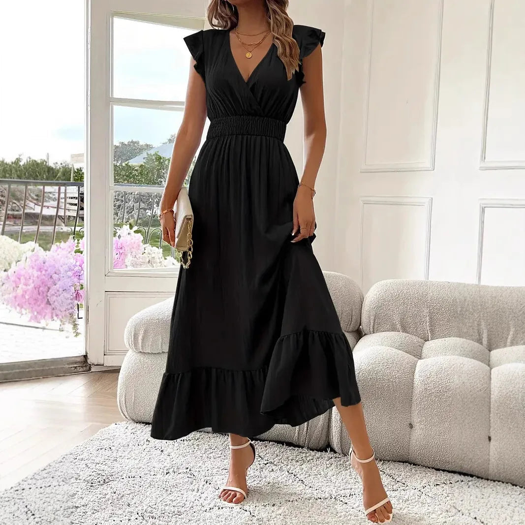Flowy V-neck maxi dress for women with stylish ruffle trim, ideal for spring fashion & comfort.