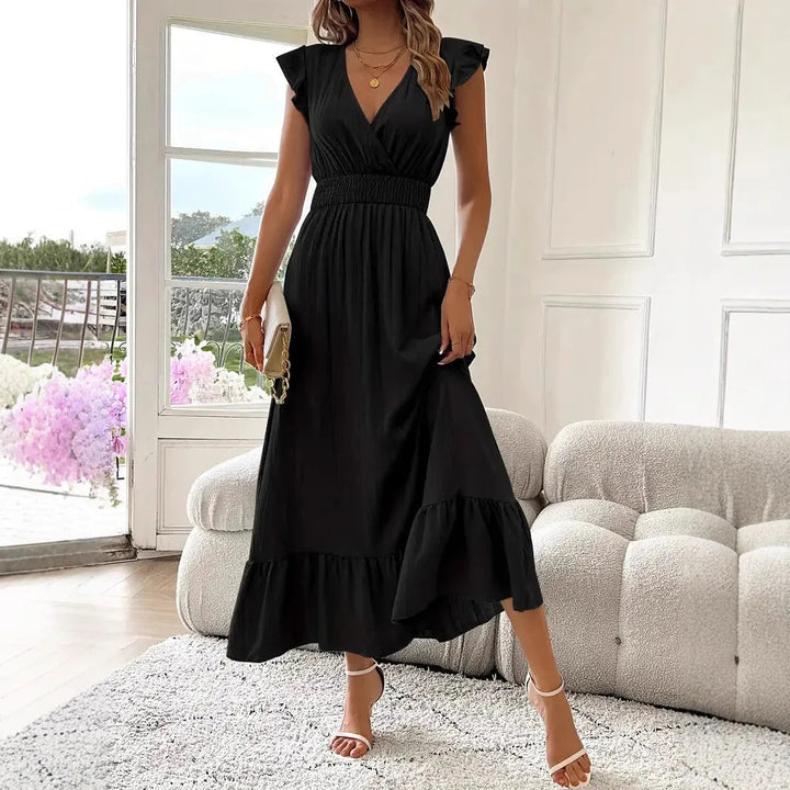 Flowy V-neck maxi dress for women with stylish ruffle trim, ideal for spring fashion & comfort.