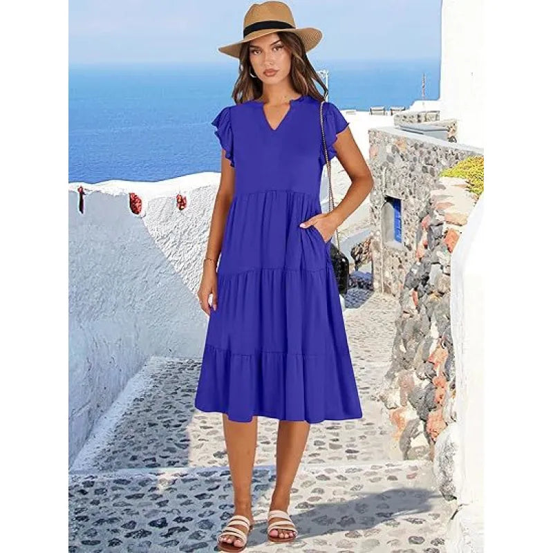 Women's V-Neck Tiered Midi Dress with Flutter Sleeves. Elegant, flowy summer style.