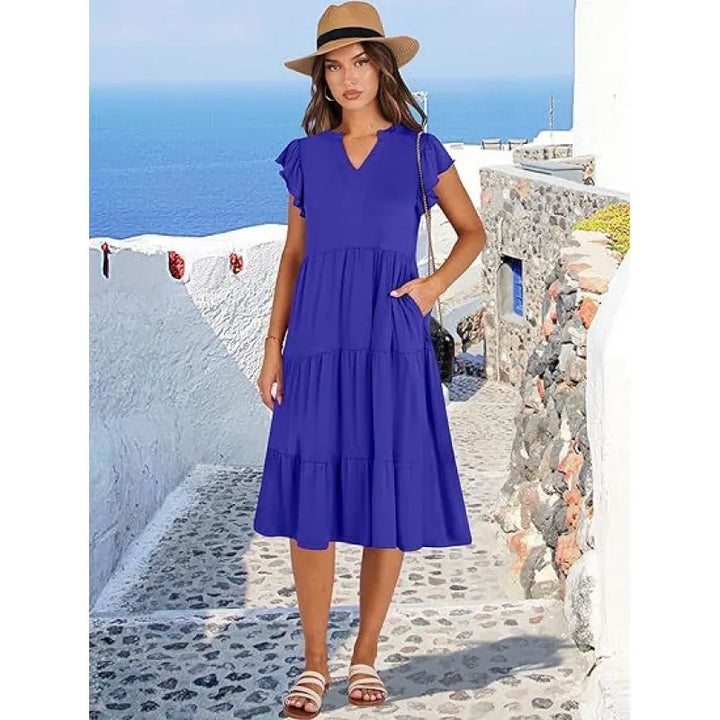 Women's V-Neck Tiered Midi Dress with Flutter Sleeves. Elegant, flowy summer style.