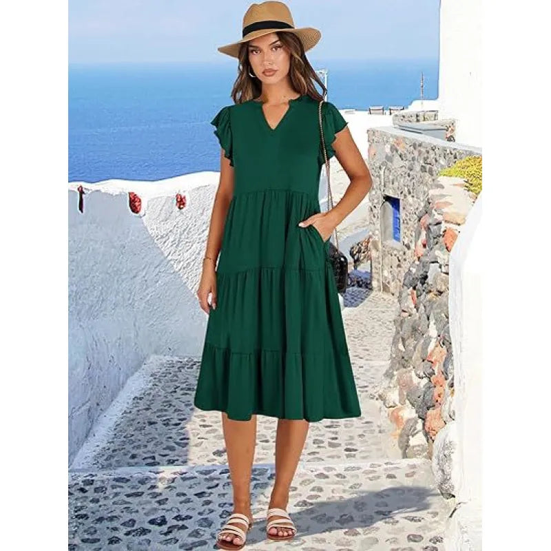 Lightweight women's V-neck tiered midi dress with flutter sleeves, ideal for casual summer outings.