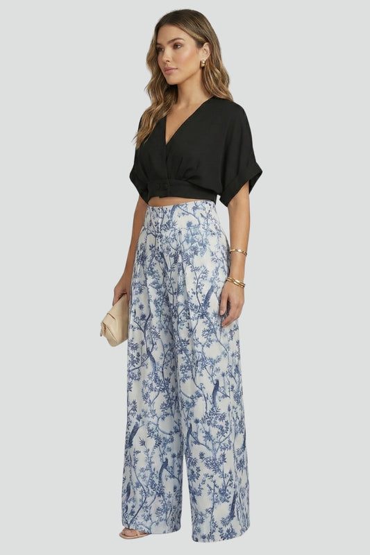 Stylish women's V-neck top and wide leg trousers two-piece set, perfect for casual summer loungewear.