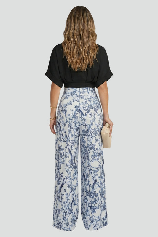 Relaxed fit women's matching set with a V-neck top and wide leg trousers, elegant and versatile fashion.