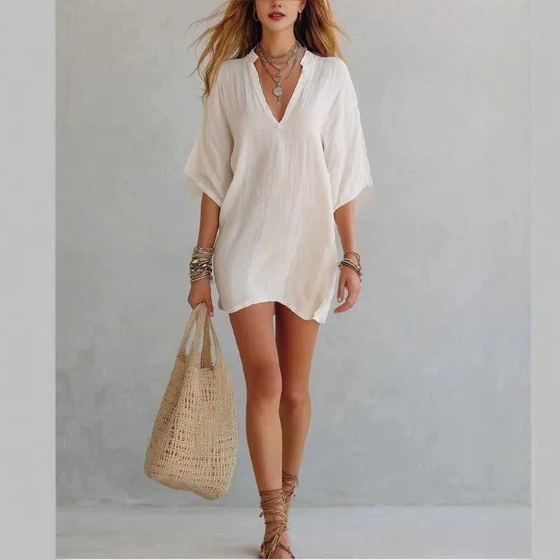 Versatile V-neck tunic mini dress for women. Perfect as a stylish beach, summer, or casual vacation dress.