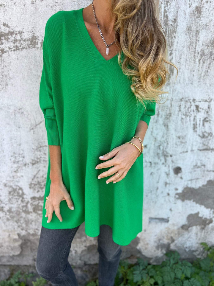Soft women's v-neck tunic jumper, a relaxed fit pullover ideal for everyday wear.