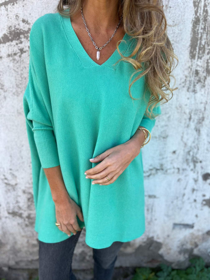 Everyday women's v-neck tunic, a comfortable swing pullover jumper ideal for versatile styling.