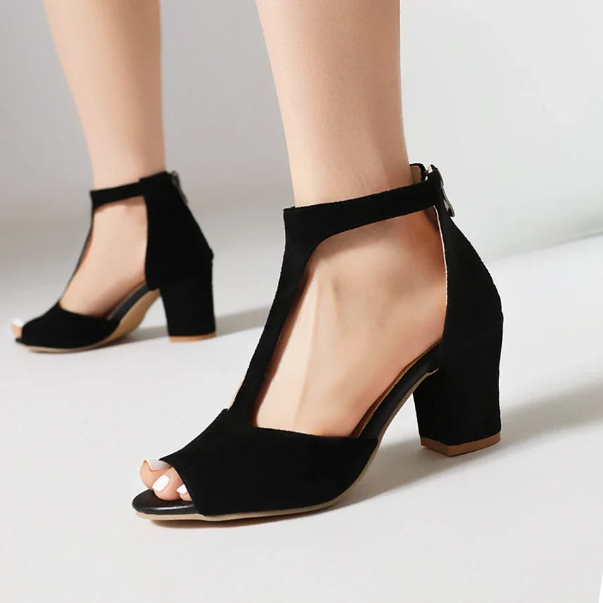Valdora women's black block heels. Open-toe T-strap elegant and comfortable footwear for stylish ladies' evenings.