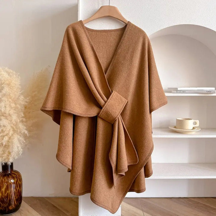 Elegant women's poncho scarf coat, a versatile outerwear wrap for comfortable, all-season layering fashion.
