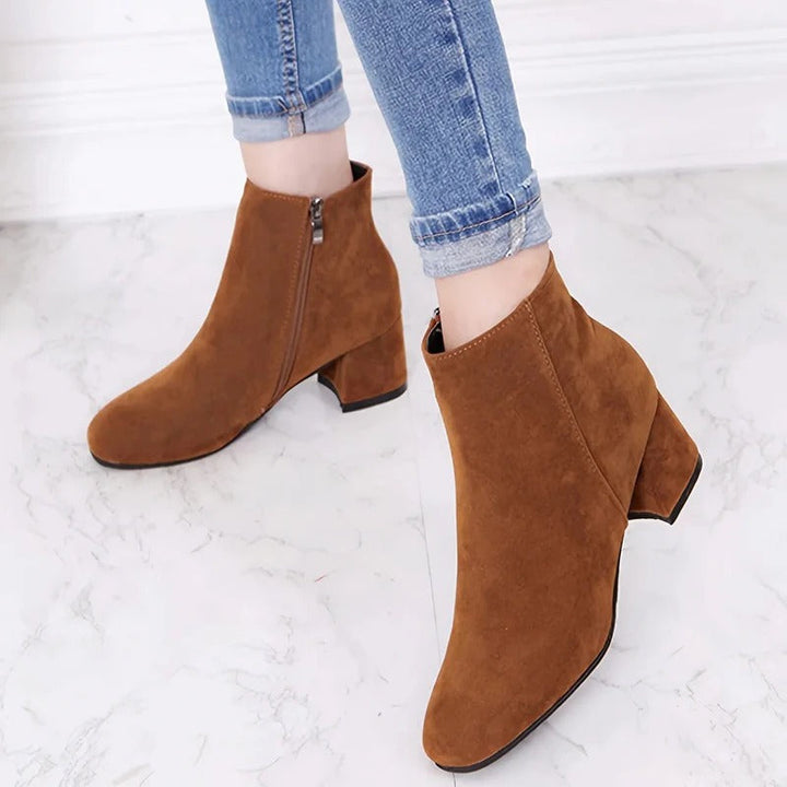 Stylish women's casual ankle boots with comfortable block heel, side zip. Ideal for fall & winter fashion.