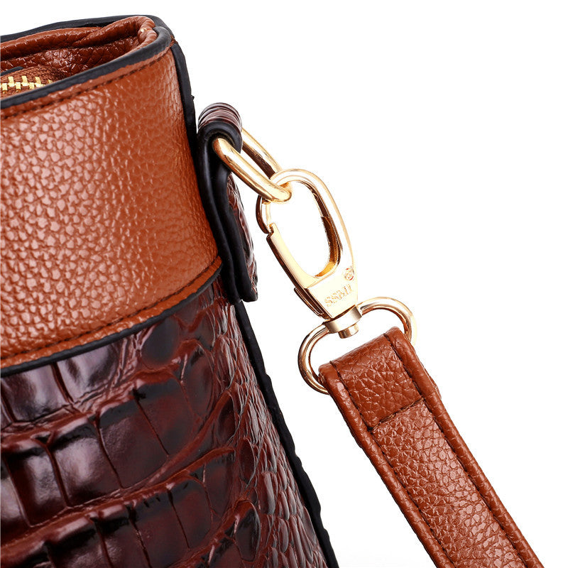 Designer look women's croc embossed handbag, a versatile faux leather shoulder bag.