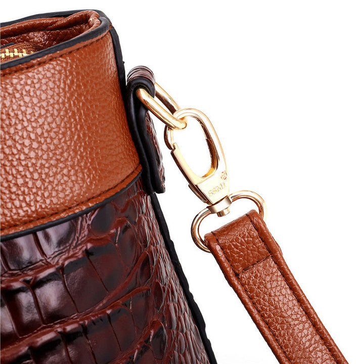 Designer look women's croc embossed handbag, a versatile faux leather shoulder bag.