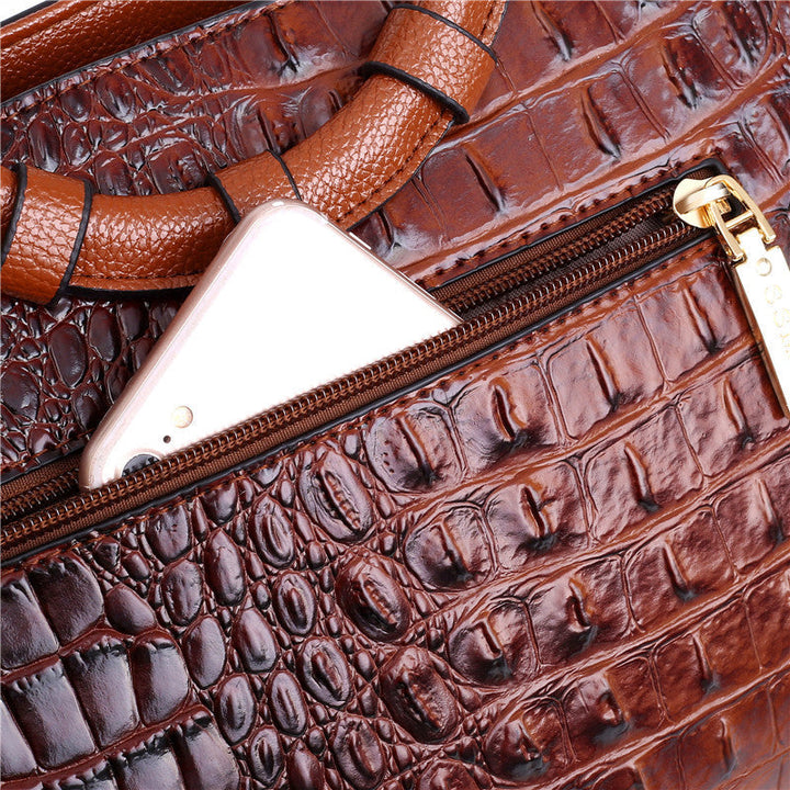 Practical women's versatile croc embossed faux leather shoulder bag accessory.