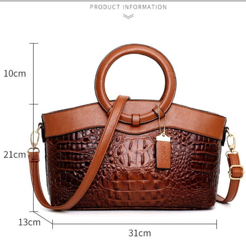Women's elegant croc embossed faux leather handbag, versatile for day or night.