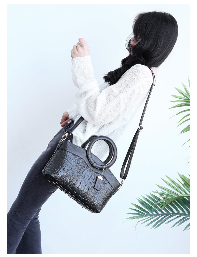 Women's stylish faux leather croc embossed shoulder bag, a versatile vintage accessory.