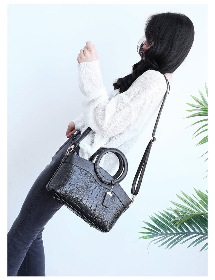 Women's stylish faux leather croc embossed shoulder bag, a versatile vintage accessory.