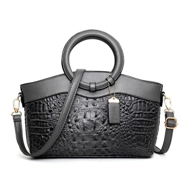 Elegant women's croc embossed faux leather shoulder bag, versatile for sophisticated style.