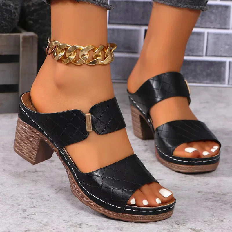 Casual yet chic women's leather sandals. Versatile block heel design offers comfort for any summer occasion.