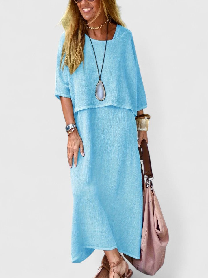 Women's versatile two-piece maxi dress set. Comfy short sleeve top & flowy skirt. Perfect for any occasion.