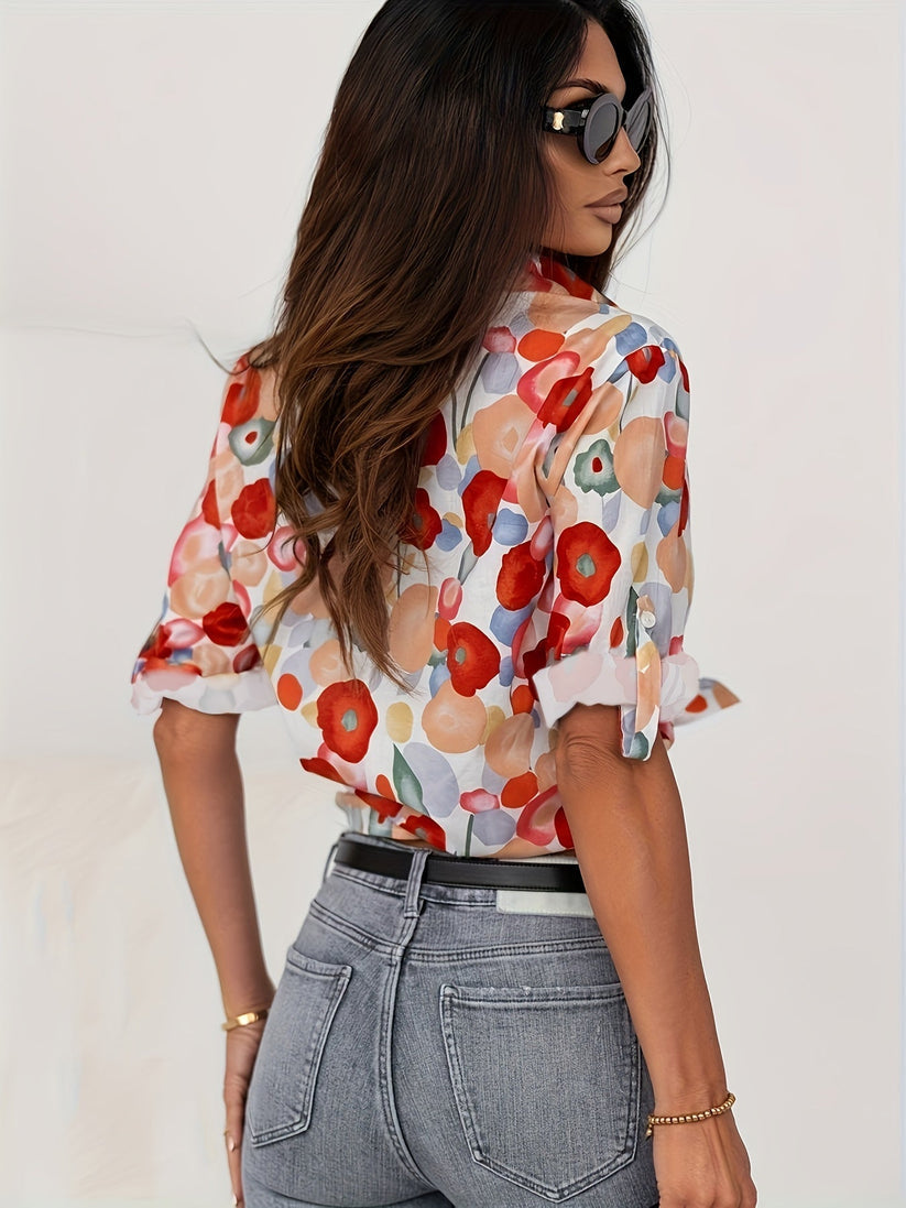 Relaxed fit women's long sleeve abstract floral button down blouse. Vibrant print, comfortable & trendy.