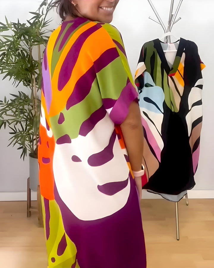Women's artistic abstract print V-neck shift dress, comfortable & vibrant for everyday spring casual.