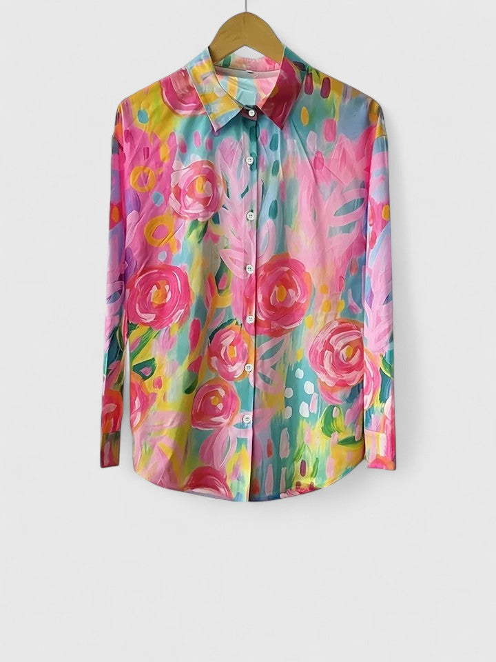 Women's button-down blouse with a unique floral abstract print and elegant long sleeves, for chic style.