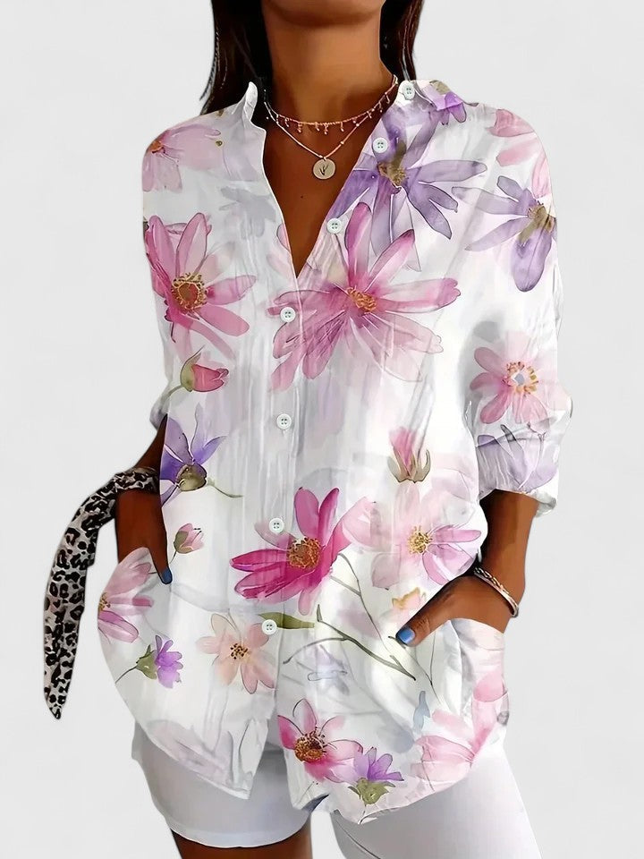 Women's casual long sleeve blouse featuring a striking floral abstract pattern, a versatile wardrobe piece.