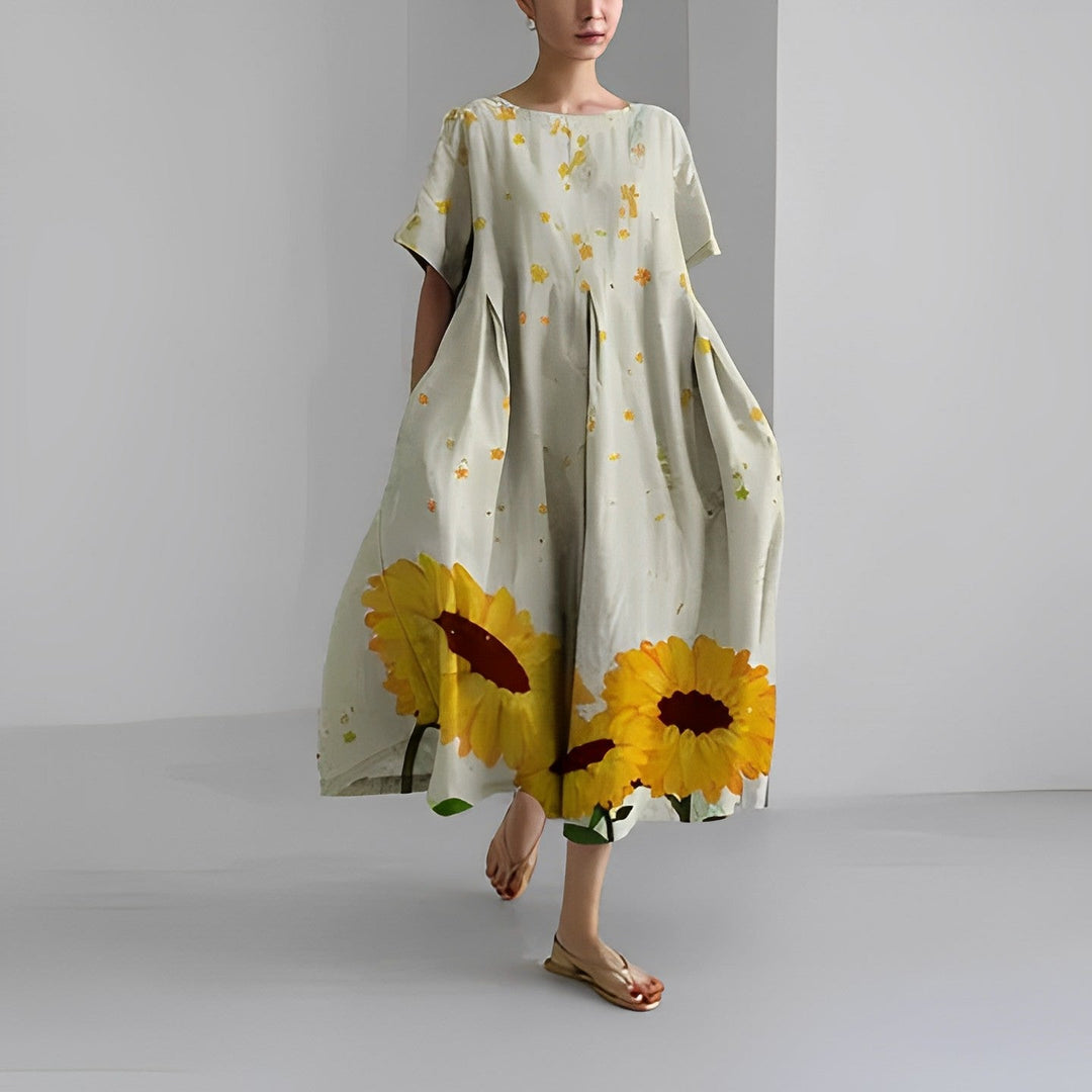 Flowy women's resort wear maxi dress, vibrant floral print, perfect for beach holidays and summer style.
